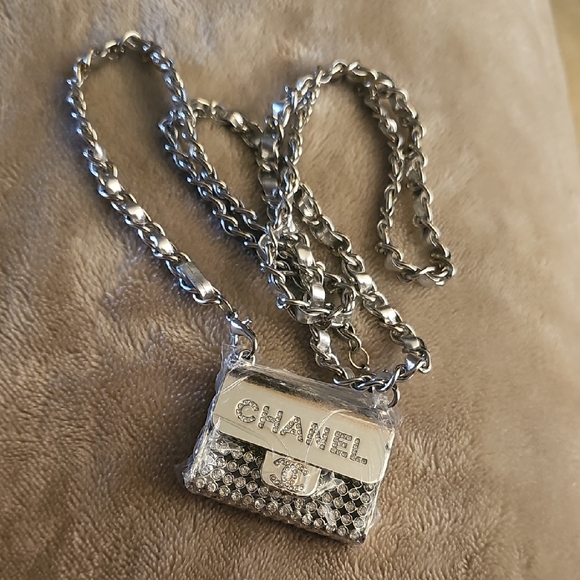CHANEL Handbags - NWOT Chanel Silver Mini Bag Necklace